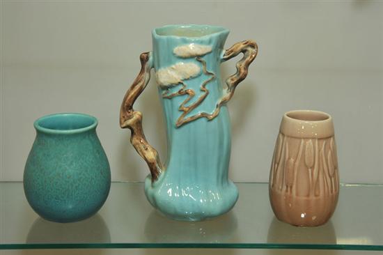 Appraisal: THREE PIECES OF ART POTTERY A Rookwood vase having molded