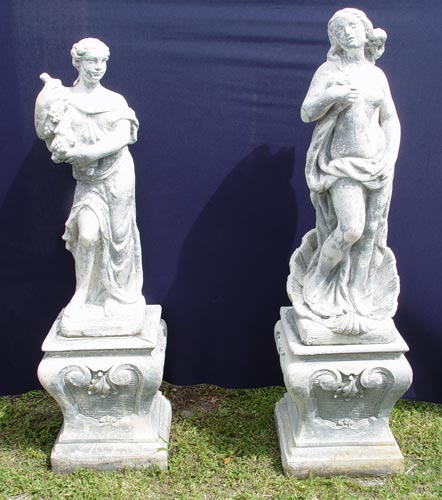 Appraisal: PAIR CONCRETE GARDEN STATUES Statues depicting Venus and woman with