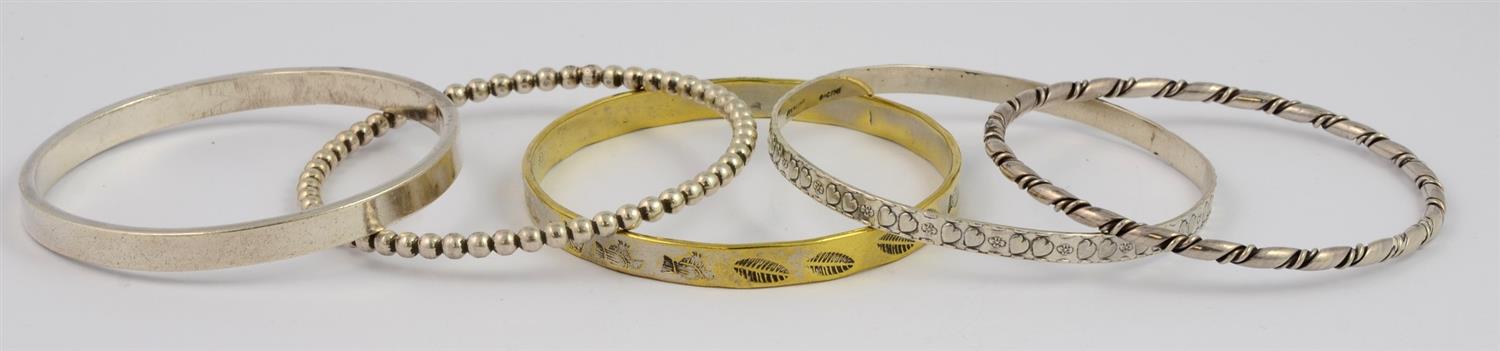 Appraisal: Hand Made Silver Bangles including one with gold wash largest