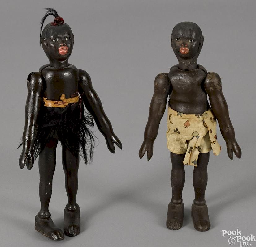 Appraisal: Two Schoenhut painted wood African natives each with a two-part