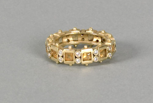 Appraisal: K yellow gold ring with square cut citrines alternating with