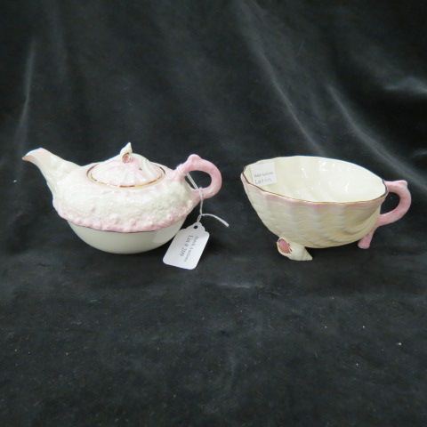 Appraisal: Fine Porcelain Figural Shell Teapot Mug Belleek style excellent