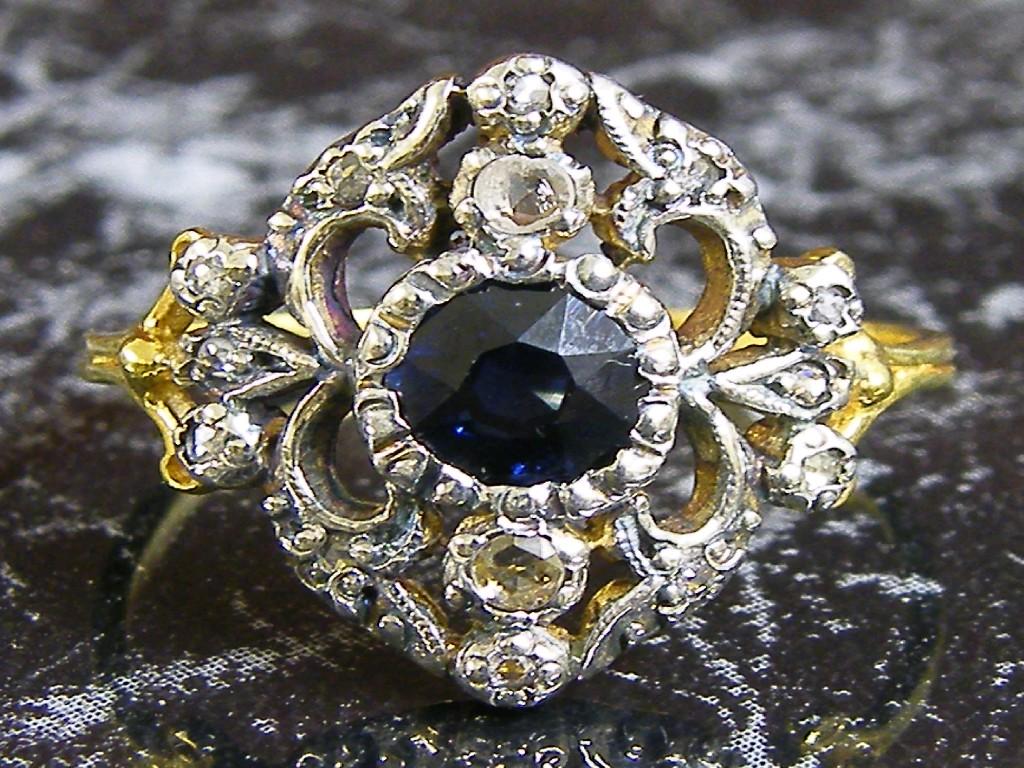 Appraisal: Attractive Art Deco style sapphire and diamond cluster ring in