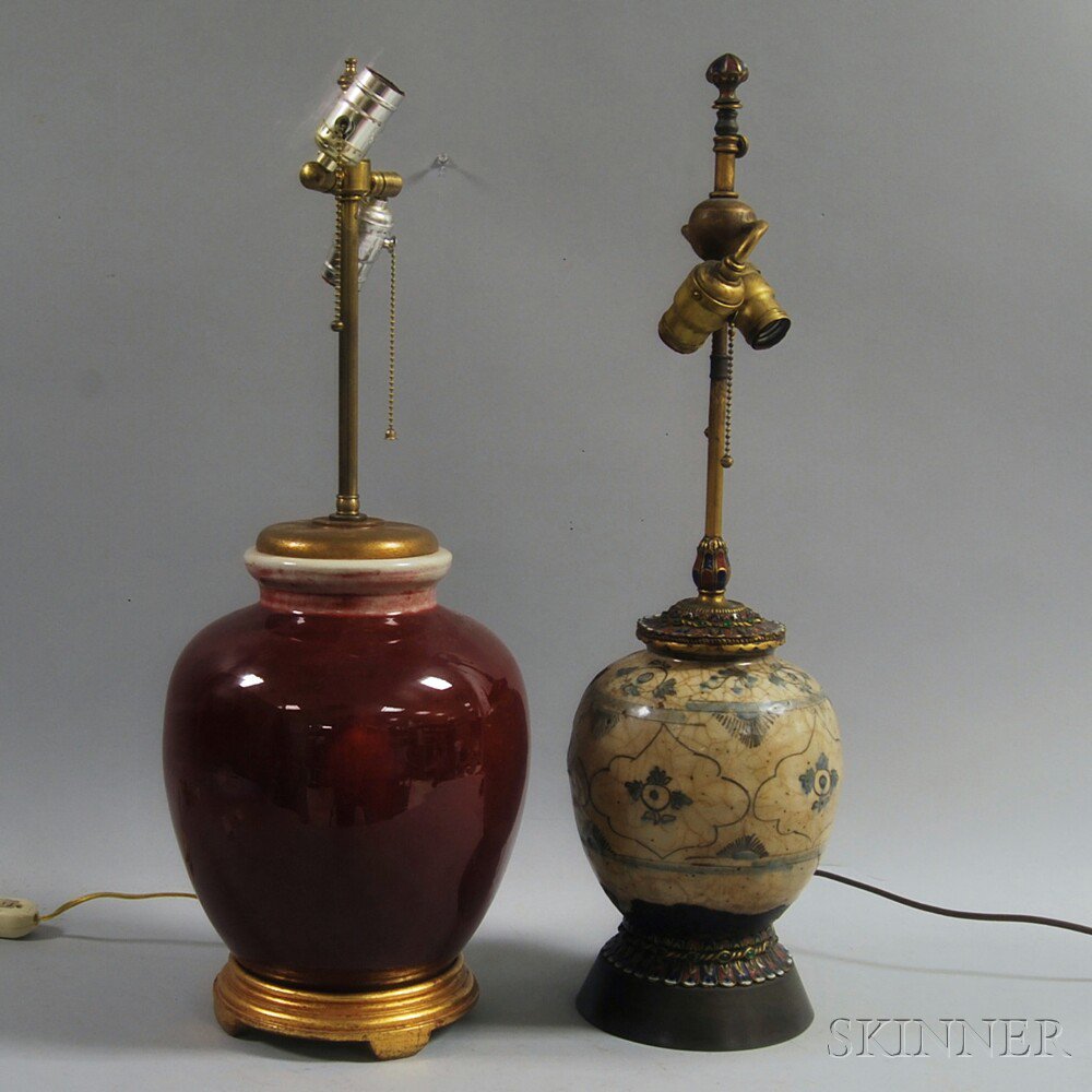 Appraisal: Two Ceramic Table Lamps an oxblood urn-form lamp with gold-painted