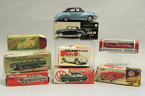 Appraisal: Boxed lithographed toy automobiles Boxed DKW Volkswagen Rambler Wagon Jaguar