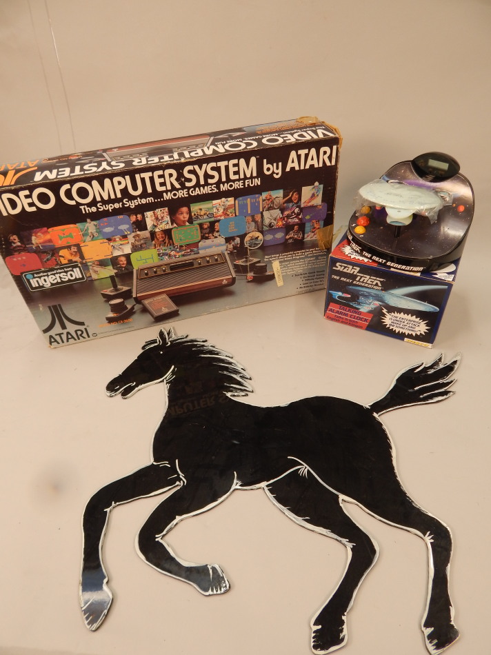 Appraisal: An Atari video computer gaming system boxed possibly incomplete a