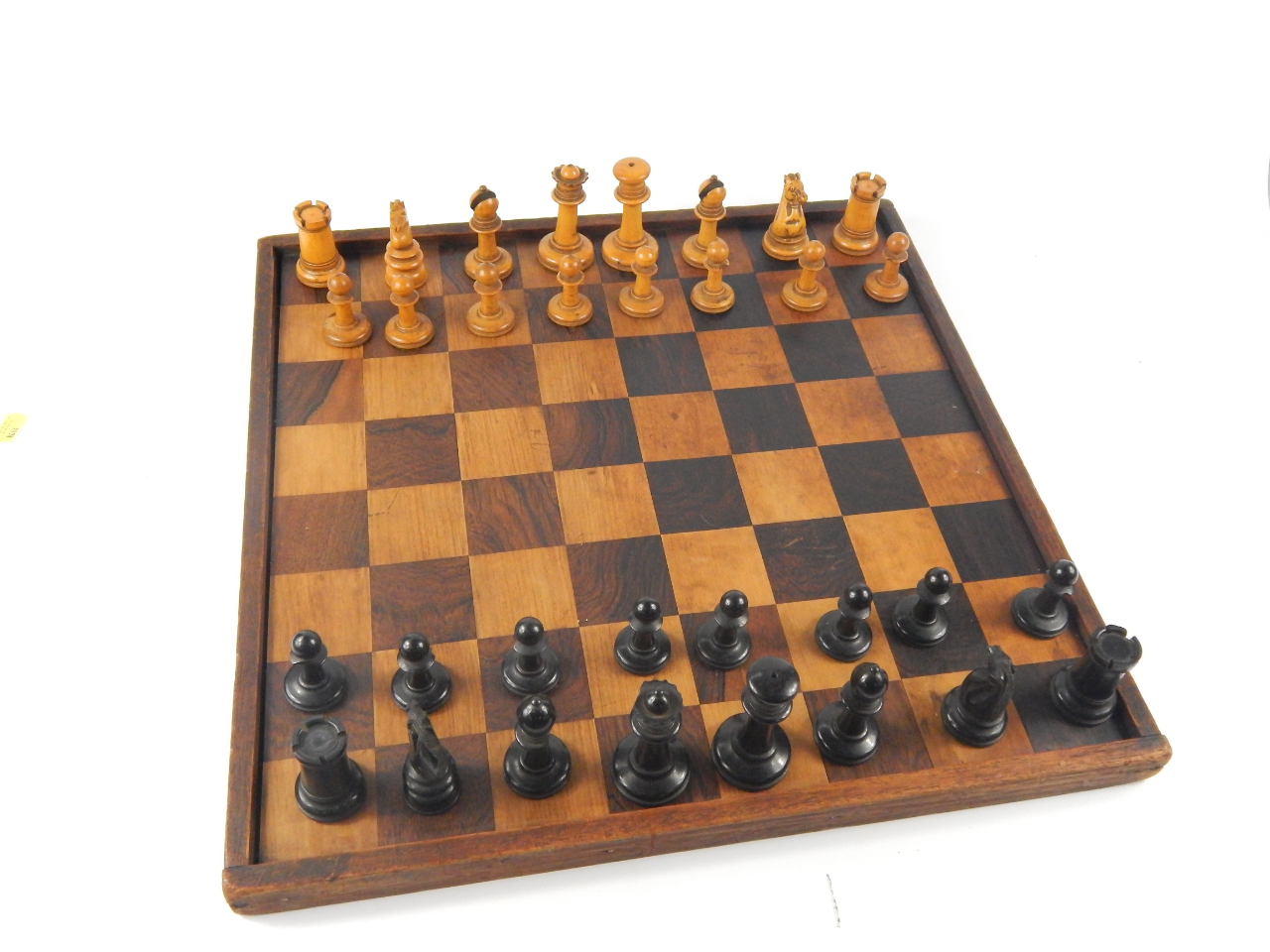 Appraisal: A Victorian turned boxwood and ebony chess set two knights