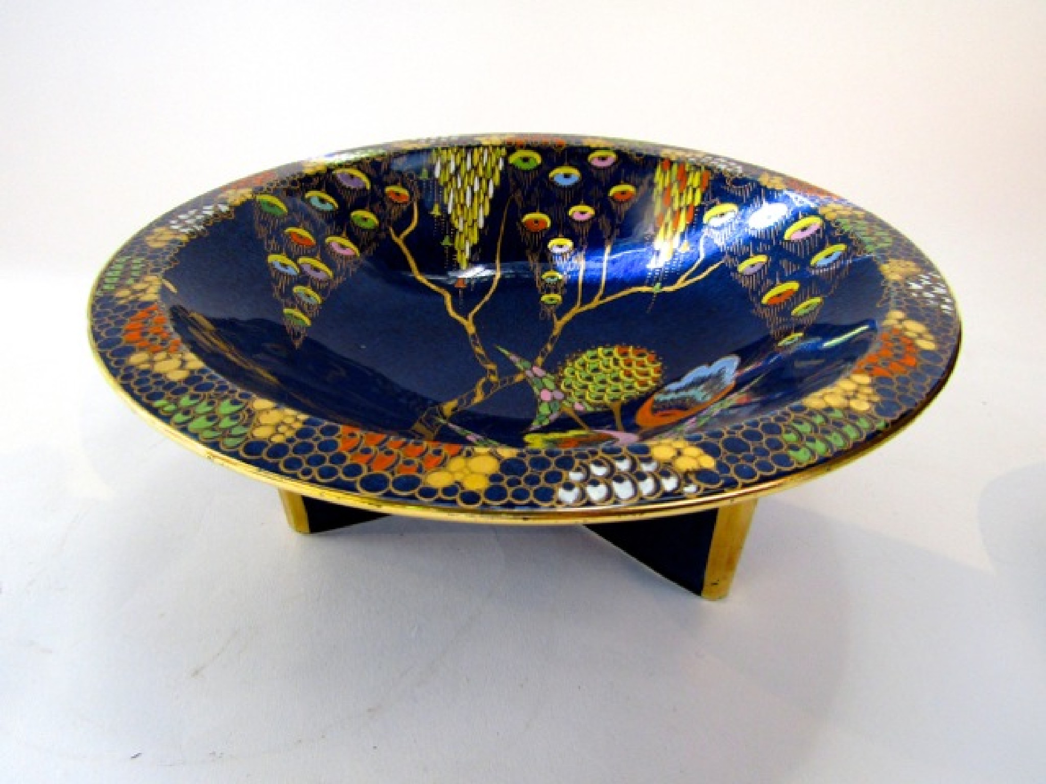 Appraisal: An unusual blue ground conical shaped Carlton ware bowl in