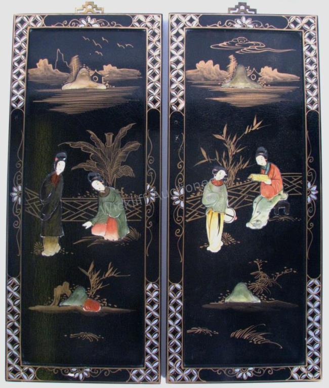 Appraisal: A pair of black lacquer Chinoiserie panels with carved stone