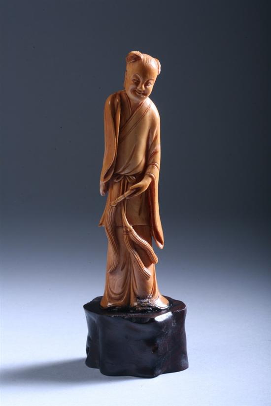 Appraisal: CHINESE IVORY FIGURE OF MAN Standing wearing long robes -