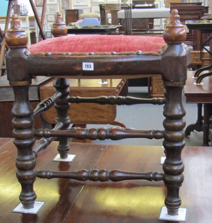 Appraisal: A th century Iberian faux grained hardwood stool on turned