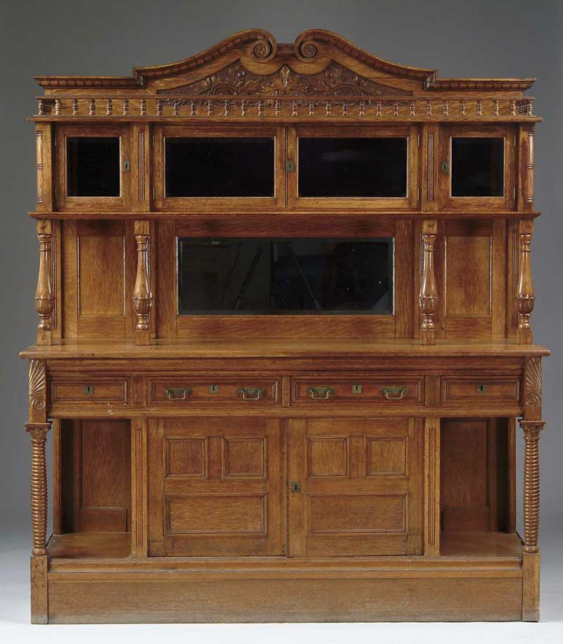 Appraisal: OUTSTANDING CARVED OAK MIRRORED BACK SIDEBOARD In three sections Bottom