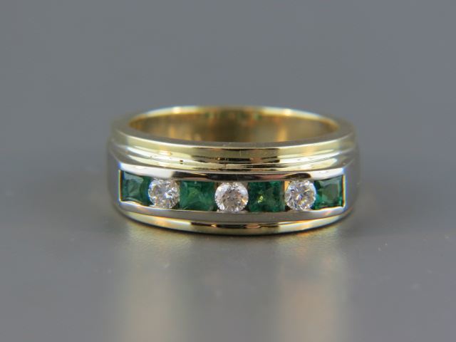 Appraisal: Emerald and Diamond Ring square emeralds totaling carats and round