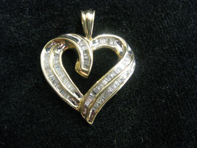 Appraisal: Diamond Heart Pendant channel set baguette diamonds totaling carat in