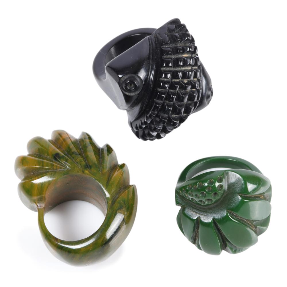 Appraisal: THREE BAKELITE RINGS DARK GREEN MARBLED GREEN AND BLACK RING