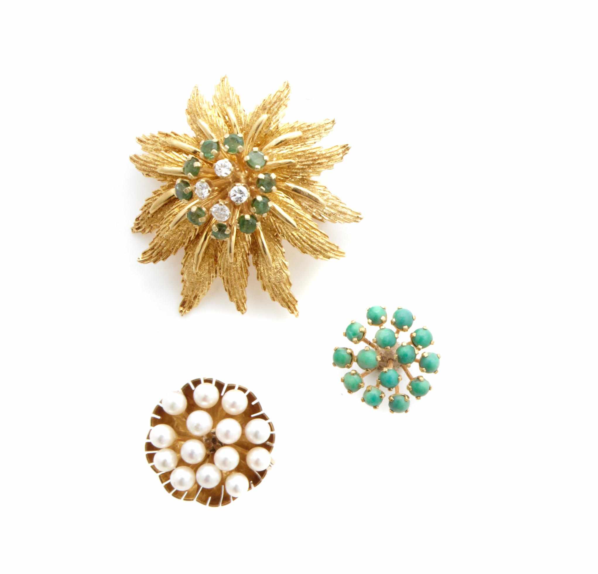 Appraisal: A gold flower brooch and ring with three interchangeable gem-set