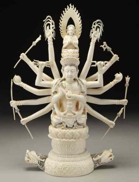 Appraisal: Chinese carved ivory -armed Buddha each arm International buyers should