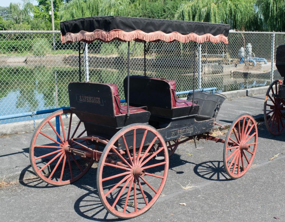 Appraisal: ANTIQUE TWO-SEAT SURREY WITH FRINGED CANOPY TOP American late th