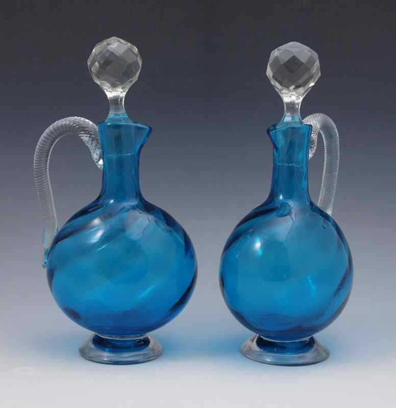 Appraisal: VENETIAN BLOWN GLASS CRUETS '' tall overall with faceted glass