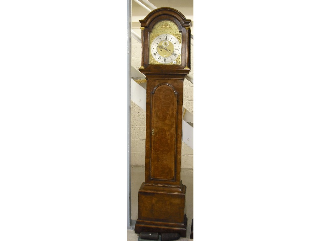 Appraisal: Walnut eight day longcase clock the brass arched dial signed