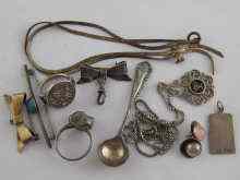 Appraisal: A mixed lot of white metal tests silver including two