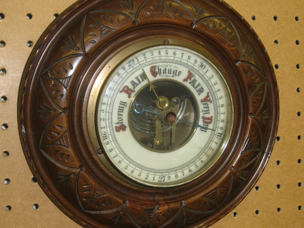 Appraisal: Carved walnut barometer