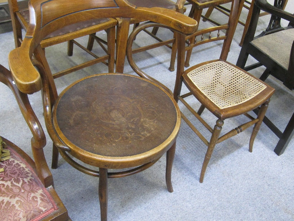 Appraisal: Lot comprising Bentwood armchair and a cane seated side chair