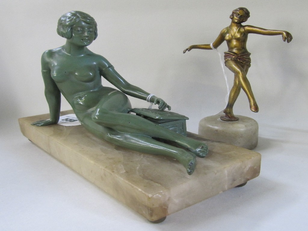 Appraisal: Two Art Deco lady figures on marble bases some def