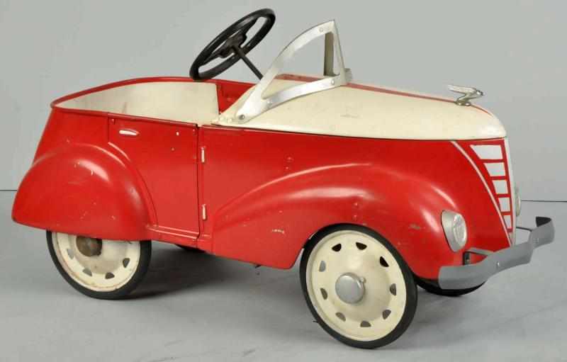 Appraisal: Pressed Steel Dendron Ford Pedal Car Description Features an opening