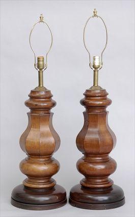 Appraisal: PAIR OF BAROQUE-STYLE WALNUT LARGE TABLE LAMPS Each octagonal pear-form