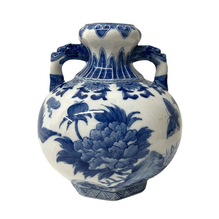 Appraisal: Blue and white Chinese Vase Antique vase depicting peacock butterflies