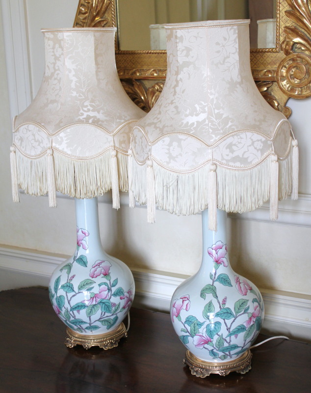 Appraisal: A pair of Chinese famille rose bottle vase lamps with