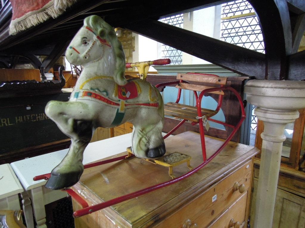 Appraisal: A Triang child's rocking horse and combined seat with tubular