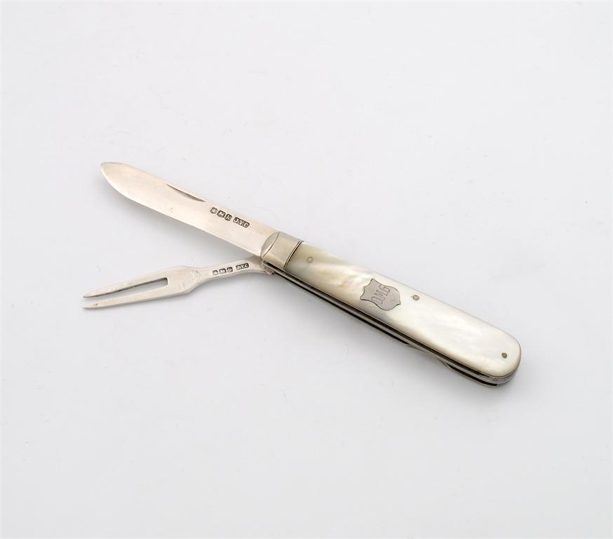 Appraisal: A silver folding fruit knife and fork