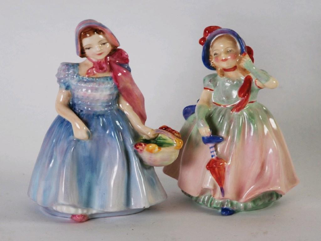 Appraisal: TWO ROYAL DOULTON SMALL CHINA FIGURES 'BABIE' HN cm high