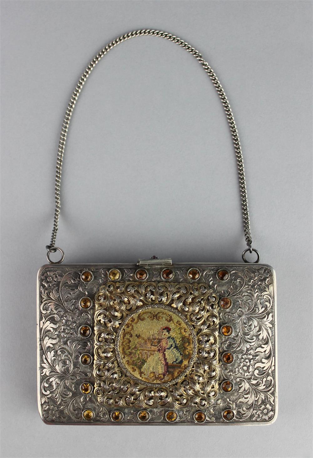 Appraisal: EUROPEAN SILVER ENGRAVED PURSE the purse is engraved with a