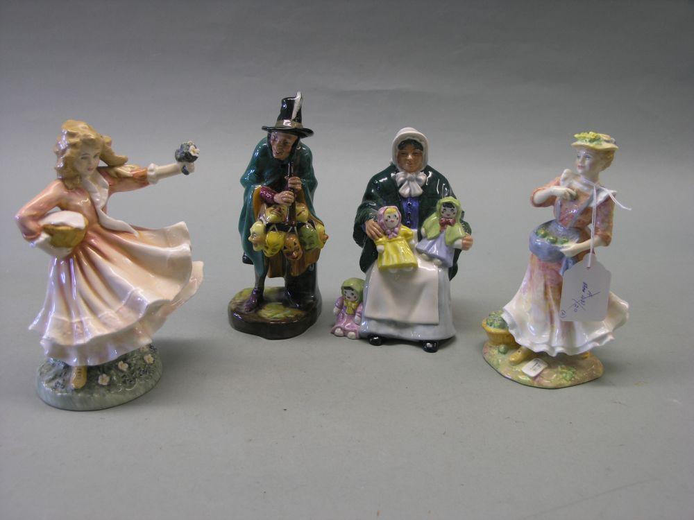 Appraisal: Four Royal Doulton figures The Rag Doll Seller HN The