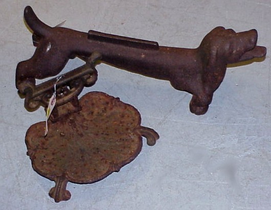 Appraisal: Two iron boot scrapers one in the form of a