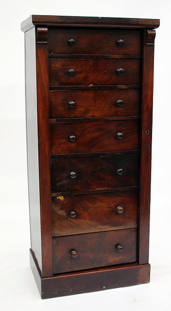 Appraisal: A VICTORIAN MAHOGANY WELLINGTON CHEST of seven long drawers with