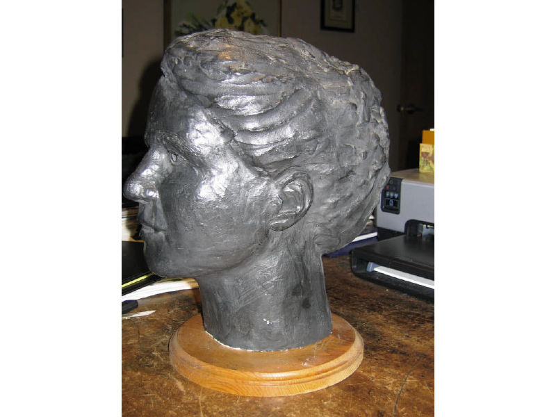 Appraisal: SANDY AMERICAN Head of a woman plaster painted black signed