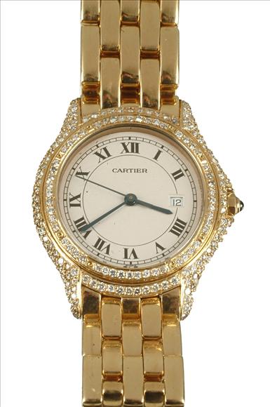 Appraisal: Cartier a lady's carat gold and diamond bracelet wrist watch