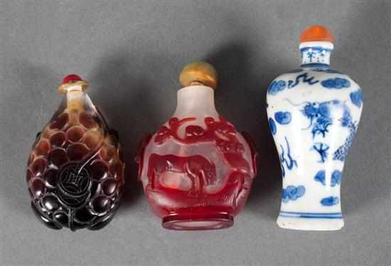 Appraisal: Two Chinese cameo glass snuff bottles and a Chinese blue