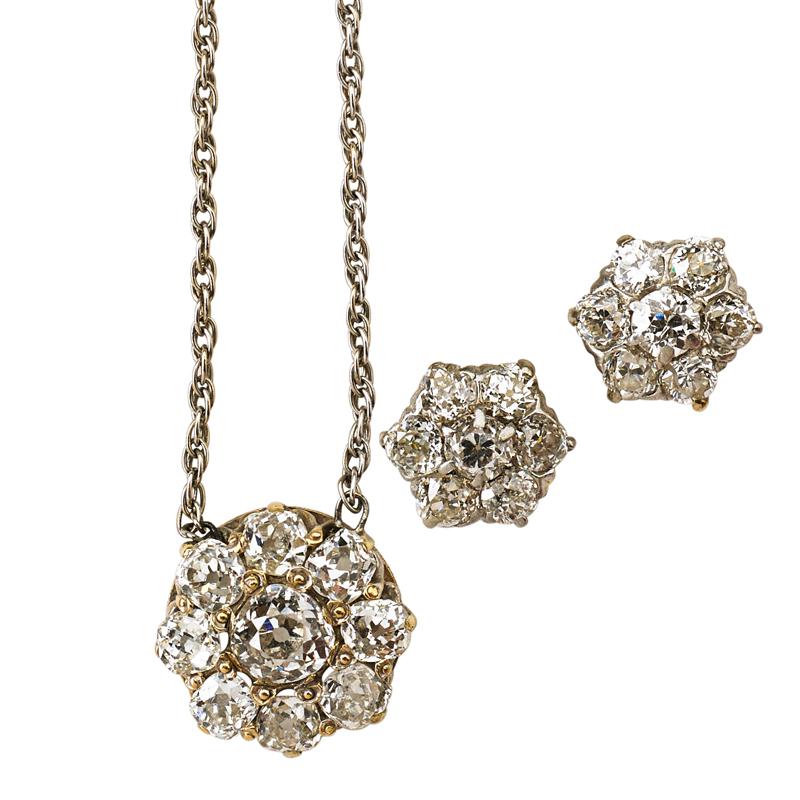 Appraisal: ANTIQUE CUT DIAMOND CLUSTER NECKLACE AND EARRINGS Floriform cluster pendant