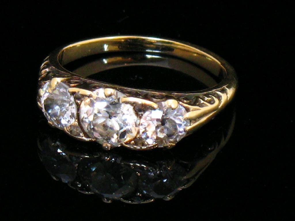 Appraisal: A THREE STONE DIAMOND DRESS RING the three graduated old-cut