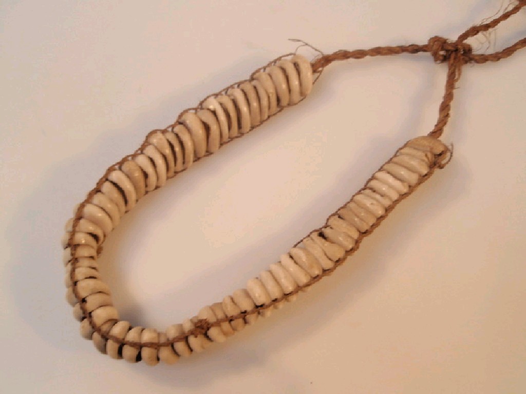 Appraisal: Tribal Art A thC tribal shell necklace probably from the