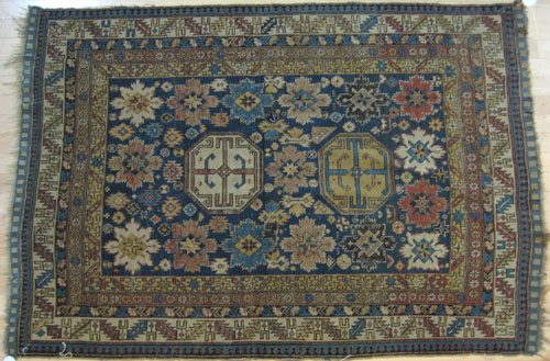 Appraisal: Shirvan carpet ca with two medallions on a blue field