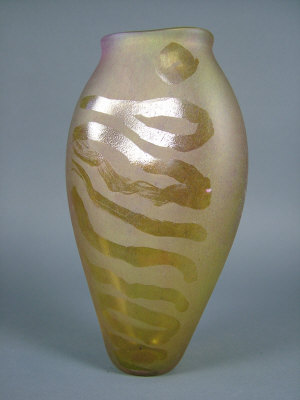 Appraisal: A yellow glass vase of flattened ovoid form decorated with