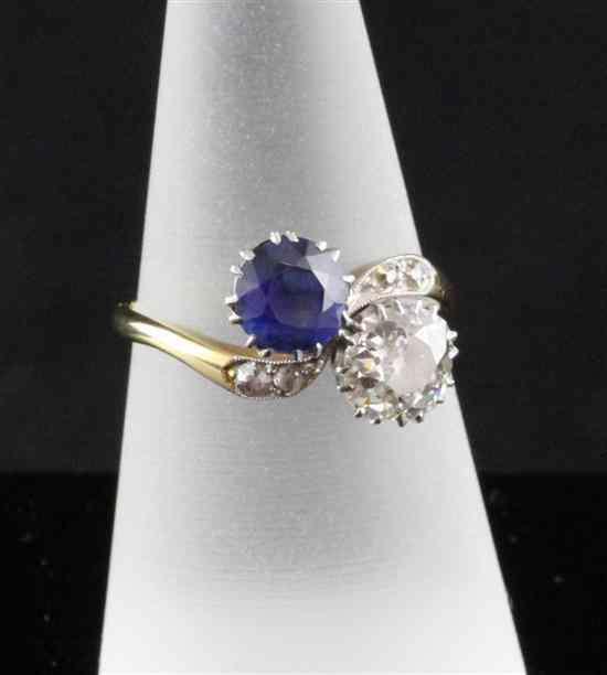 Appraisal: An ct gold sapphire and diamond cross-over ring size O