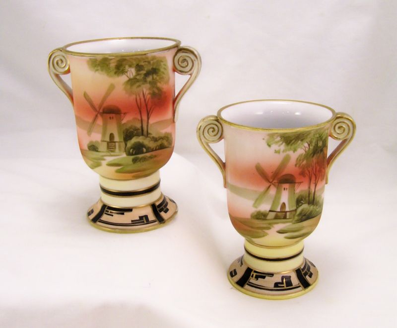 Appraisal: Pair Nippon Porcelain Chalice Vases Double swirl handle gold decoration