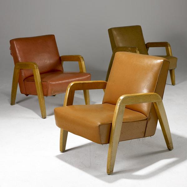 Appraisal: RUSSEL WRIGHT Three lounge chairs upholstered in vinyl on blonde